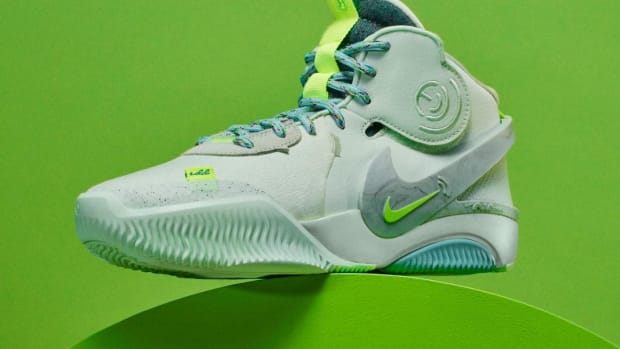 View of green and blue Nike Air Deldon.